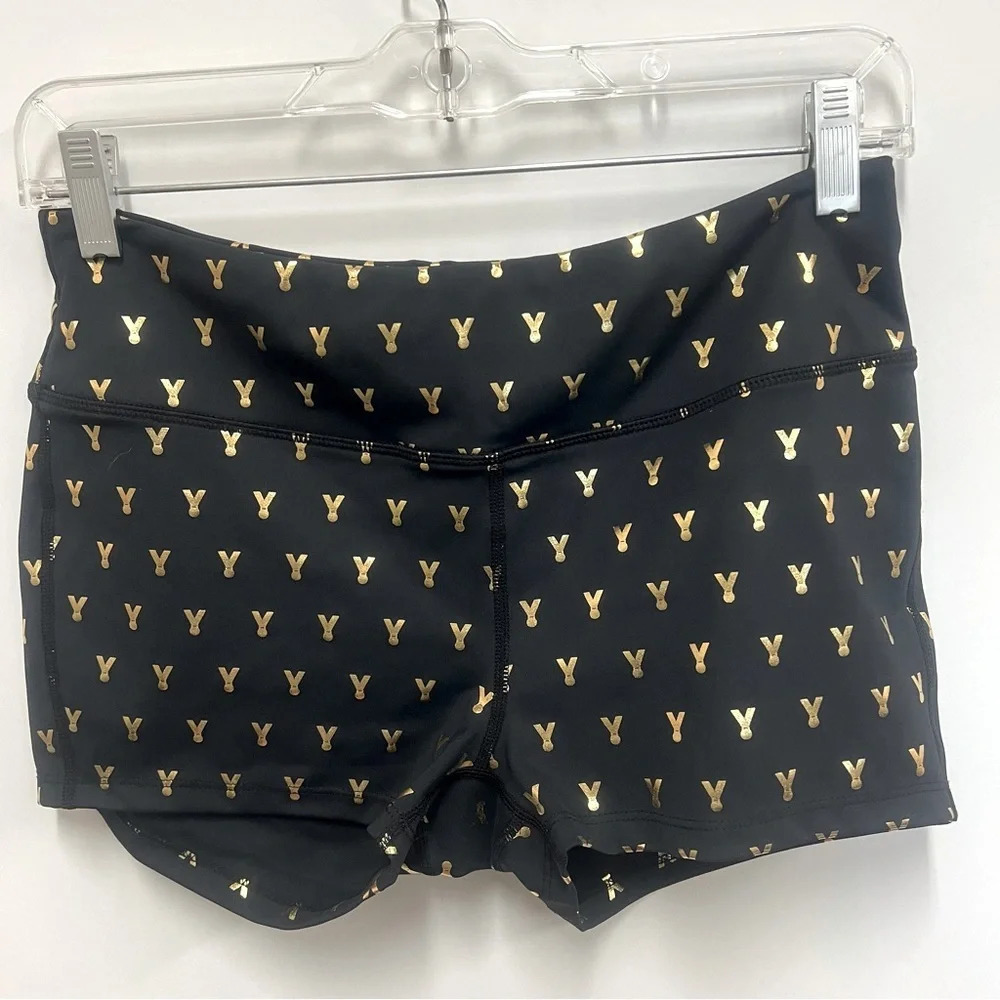 Oiselle Gold Mettle short shorts, with metallic medal pattern size medium